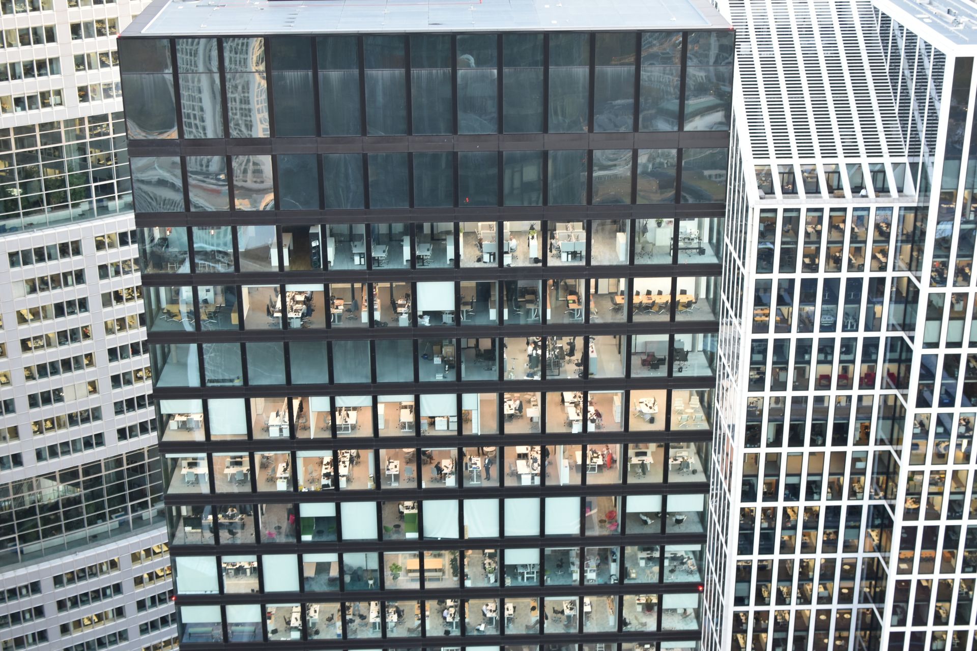 Office tower with visible leased interiors